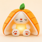Raby - conejito naranja con luz cálida